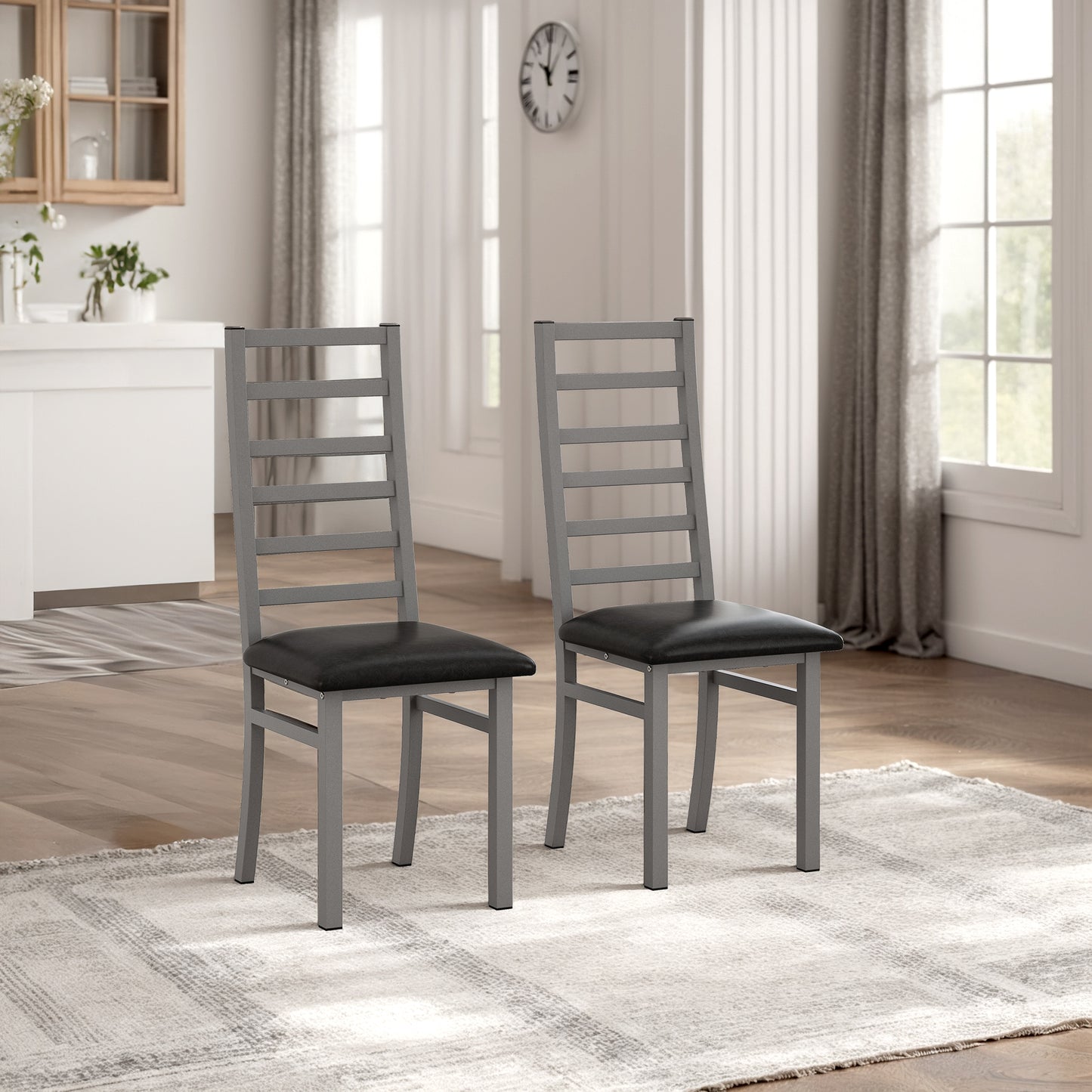 Pair of gray metal dining chairs with black upholstered seats