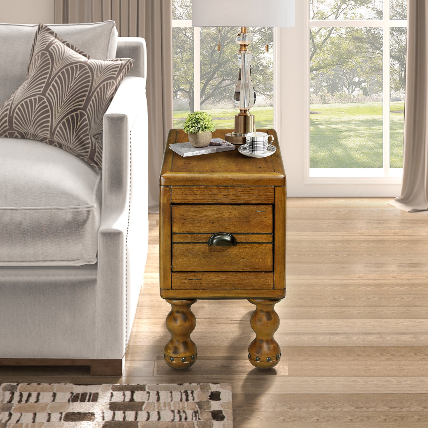 Rustic wooden end table with two drawers and decorative bun feet