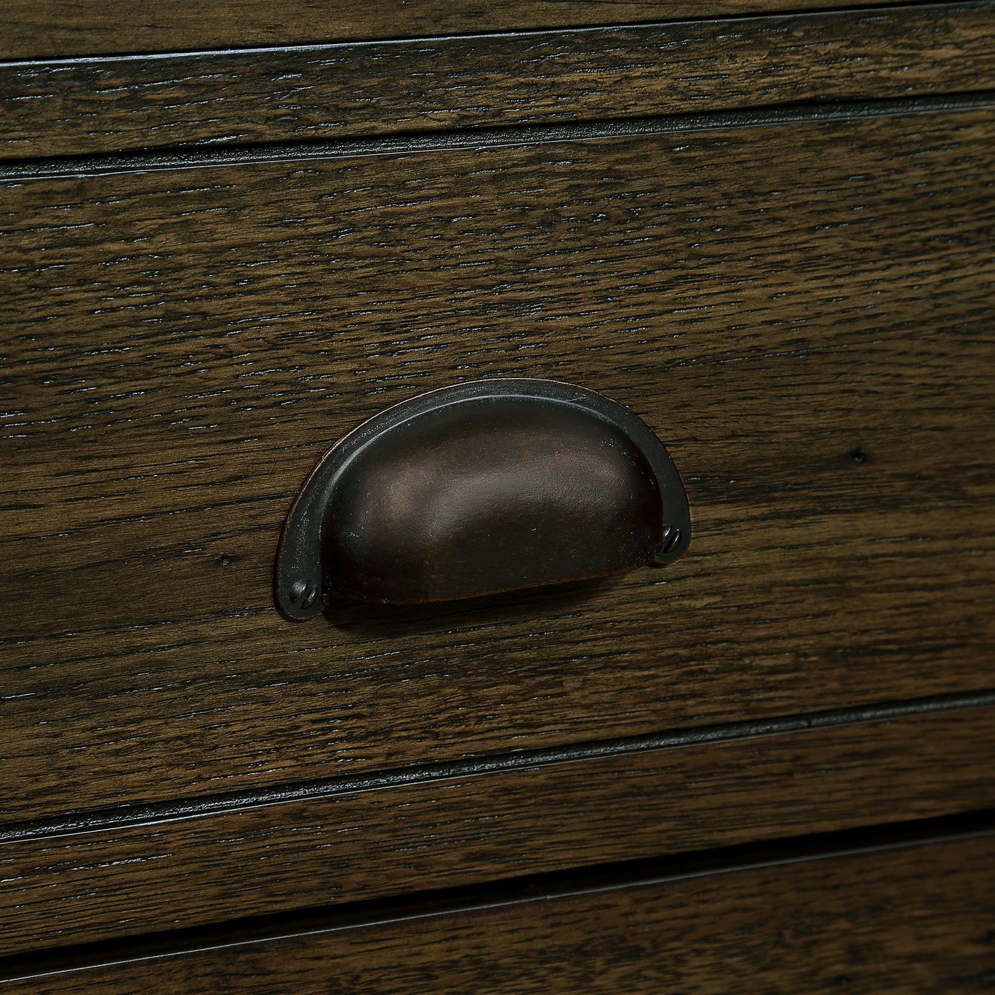 Rustic dark wood drawer with antique bronze cup pull