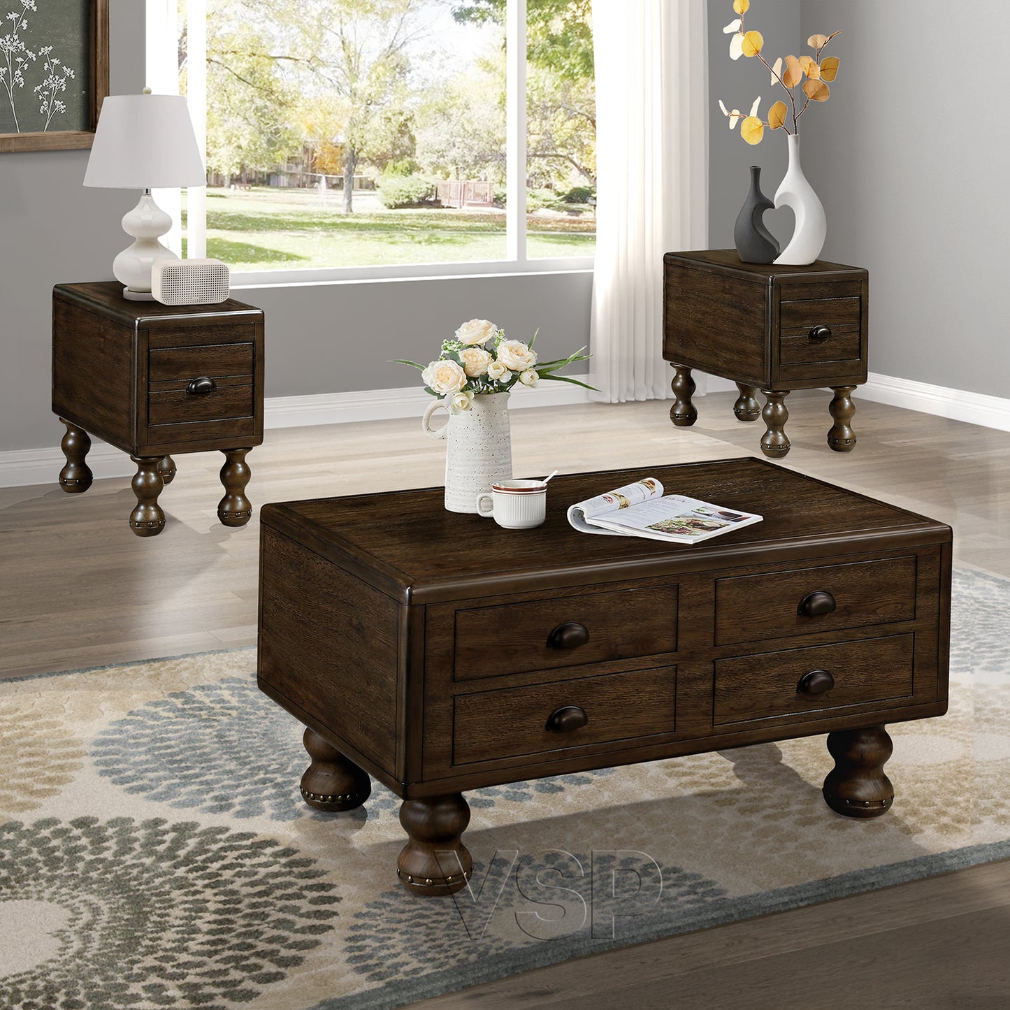 Dark wood coffee table with four drawers and turned legs