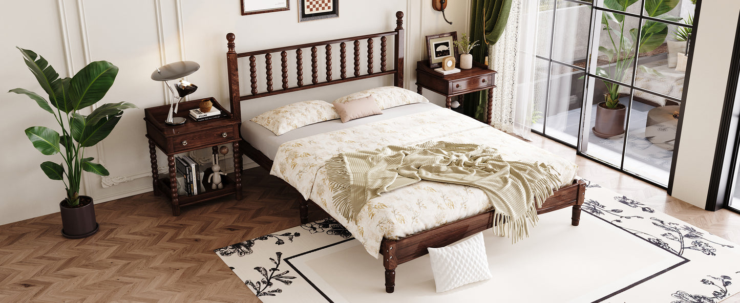 Dark wood spindle bed frame with floral bedding and beige throw