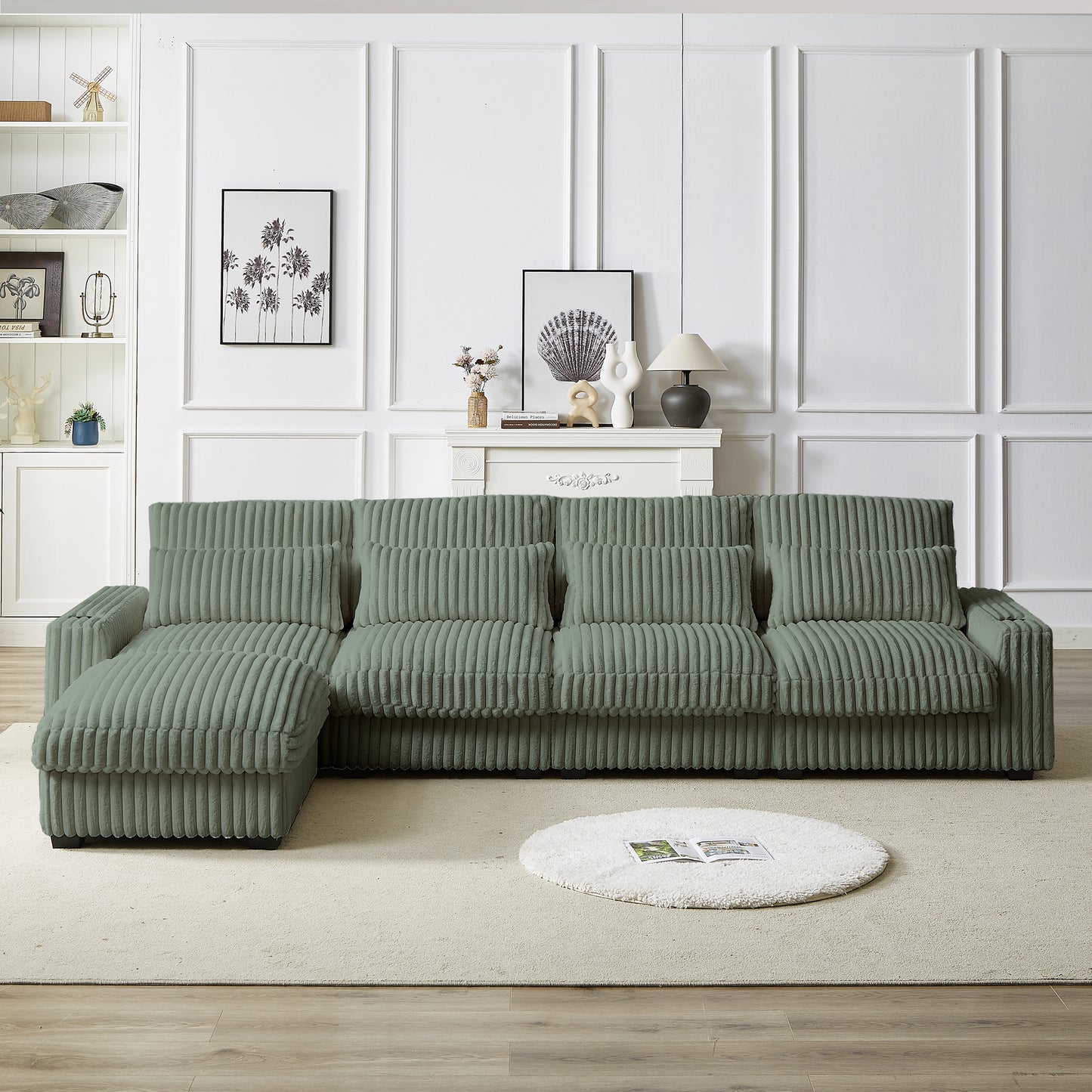 Sage green corduroy sectional sofa with plush cushions and chaise lounge