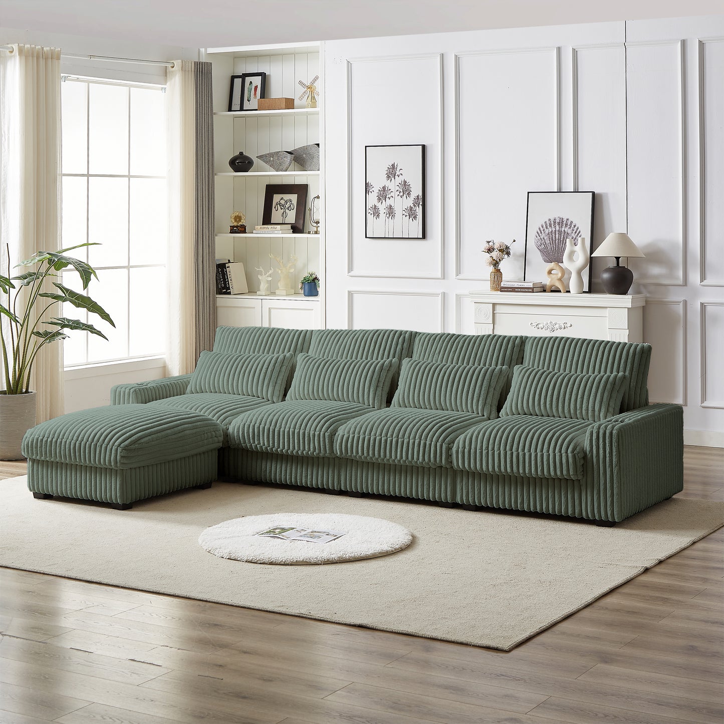 Sage green corduroy sectional sofa with plush pillows and chaise lounge perfect for modern living rooms