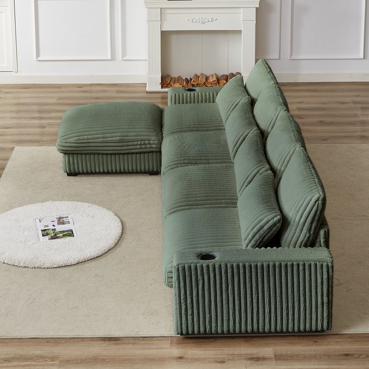Sage green corduroy sectional sofa with plush cushions and ottoman