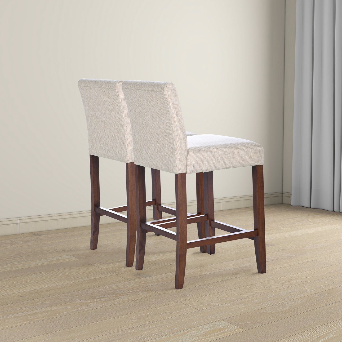 Two beige upholstered bar stools with dark wood legs