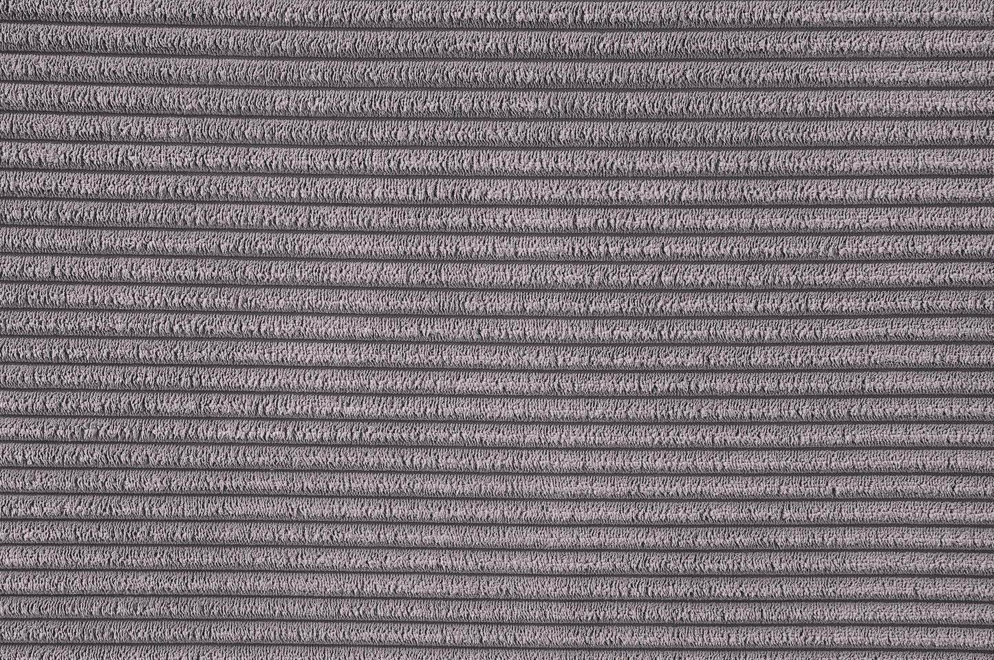 Closeup of thick grey corduroy fabric texture with raised ridges