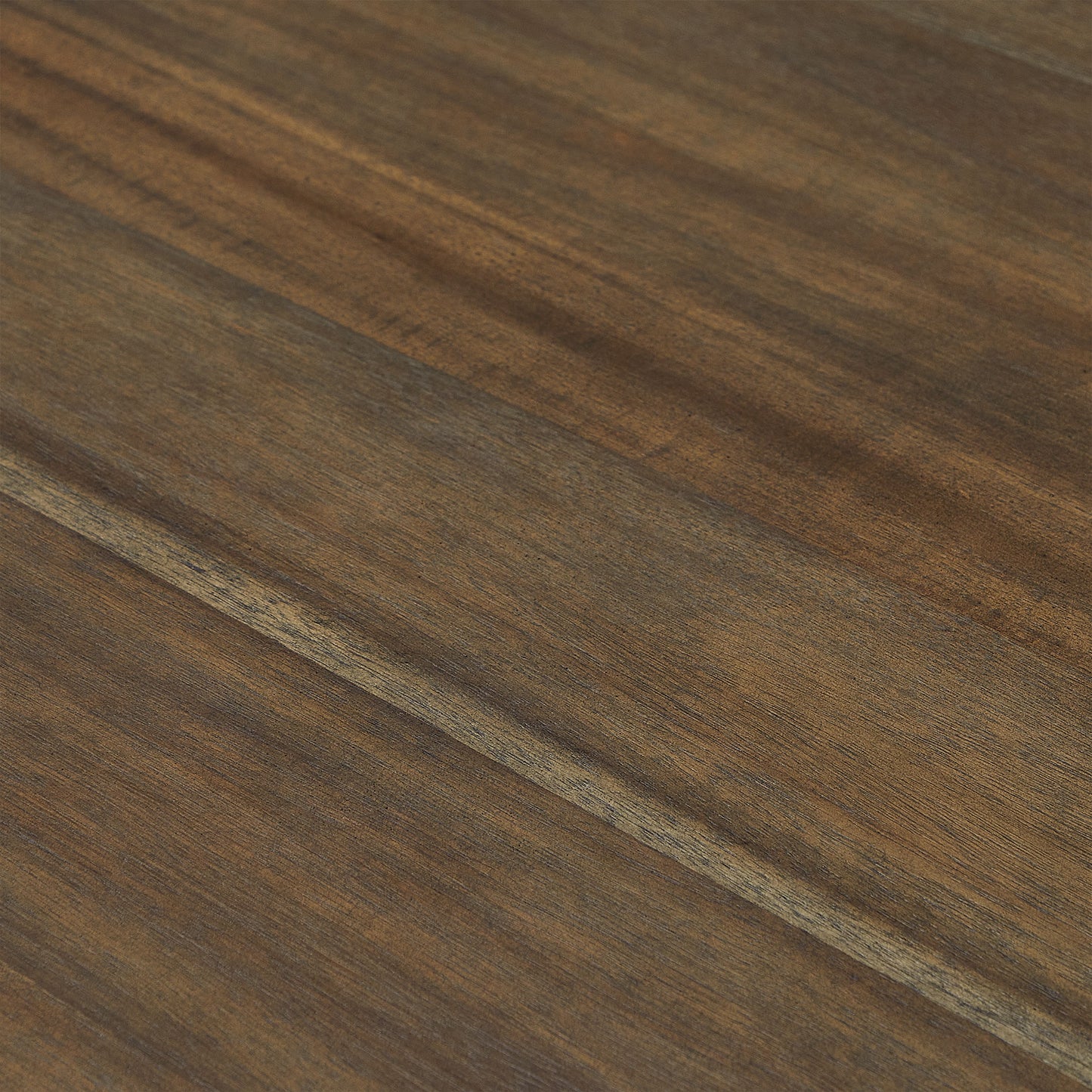 Closeup of rich brown walnut wood grain texture showing natural patterns