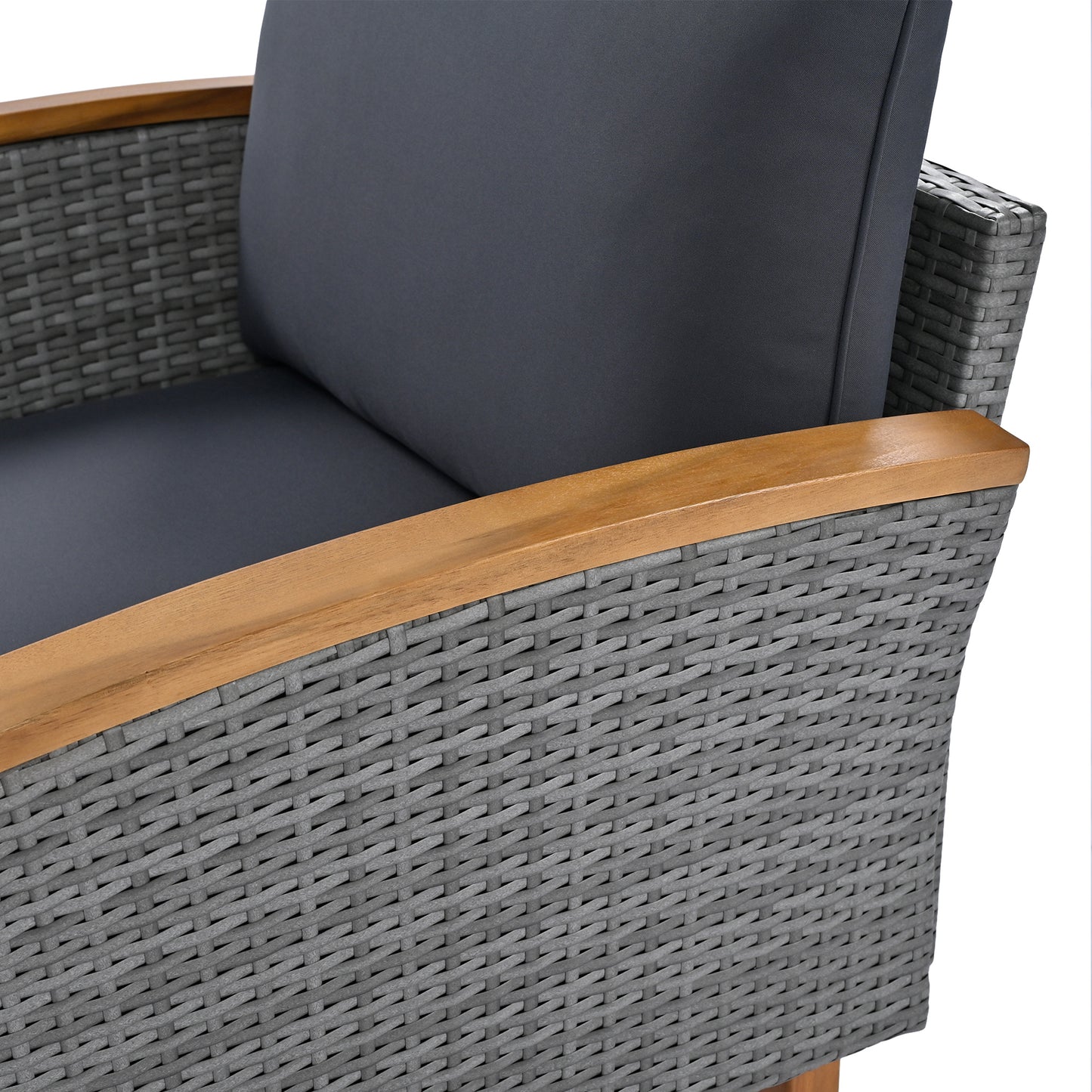 Gray wicker armchair with wooden armrests and dark gray cushions