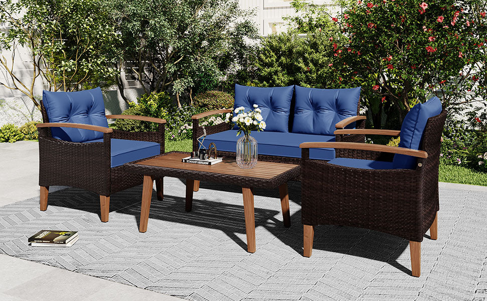 Brown wicker patio set with blue cushions and wooden accents
