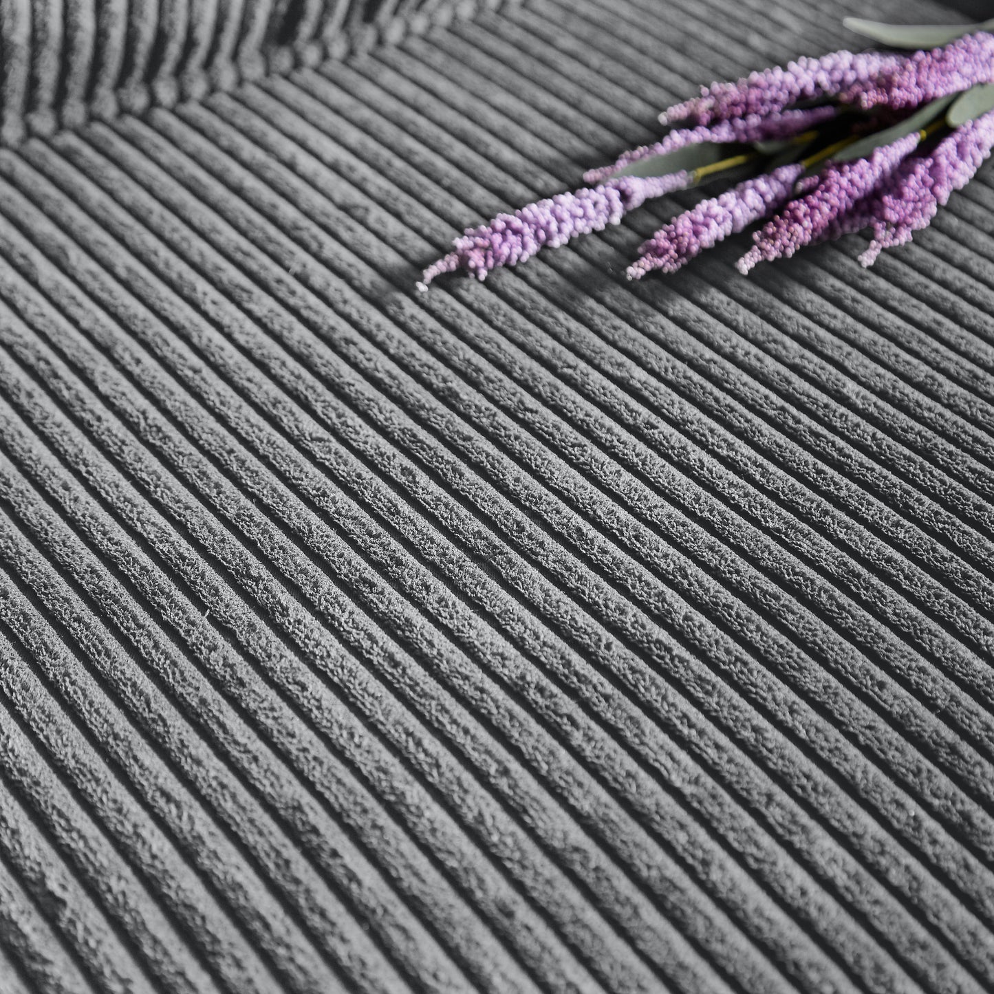 Textured gray corduroy fabric with purple lavender sprigs