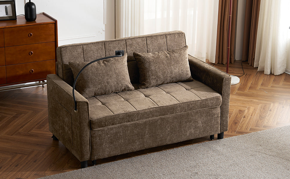 Taupe fabric sofa bed with tufted seat and two throw pillows