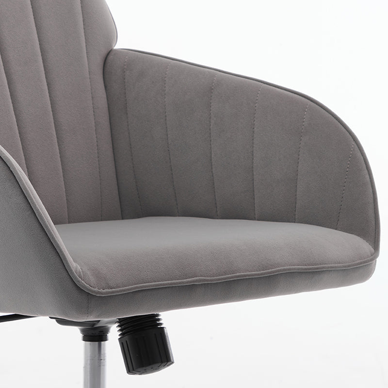 Gray velvet accent chair with channeled back and padded seat