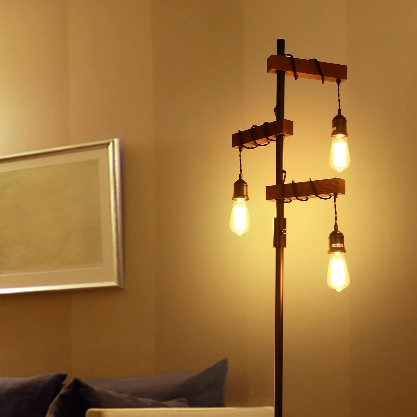 Rustic floor lamp with three Edison bulbs hanging from wooden beams