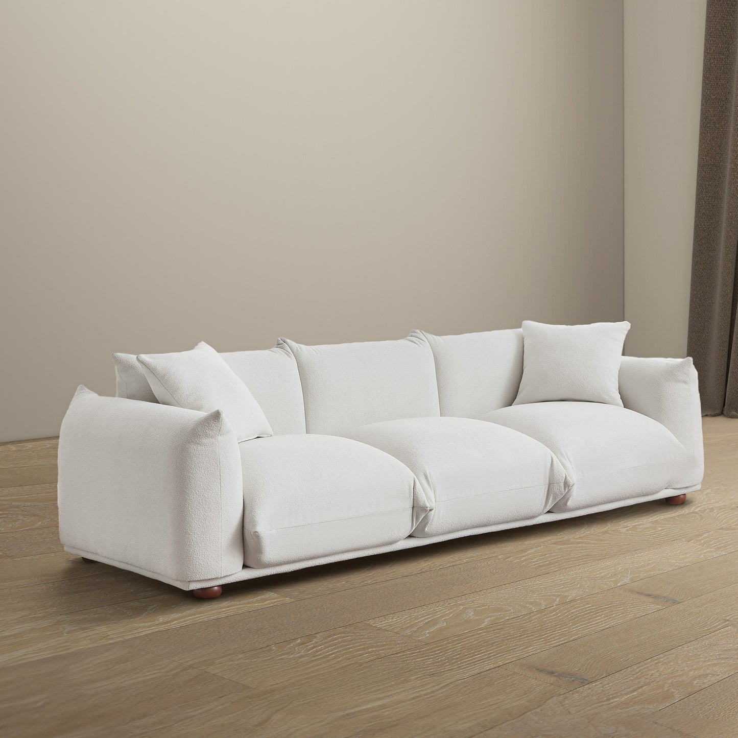 Plush white boucle fabric sofa with deep seats and plush cushions for ultimate comfort