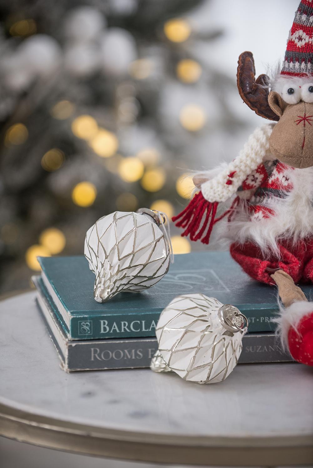 White geometric pinecone Christmas ornament with silver accents