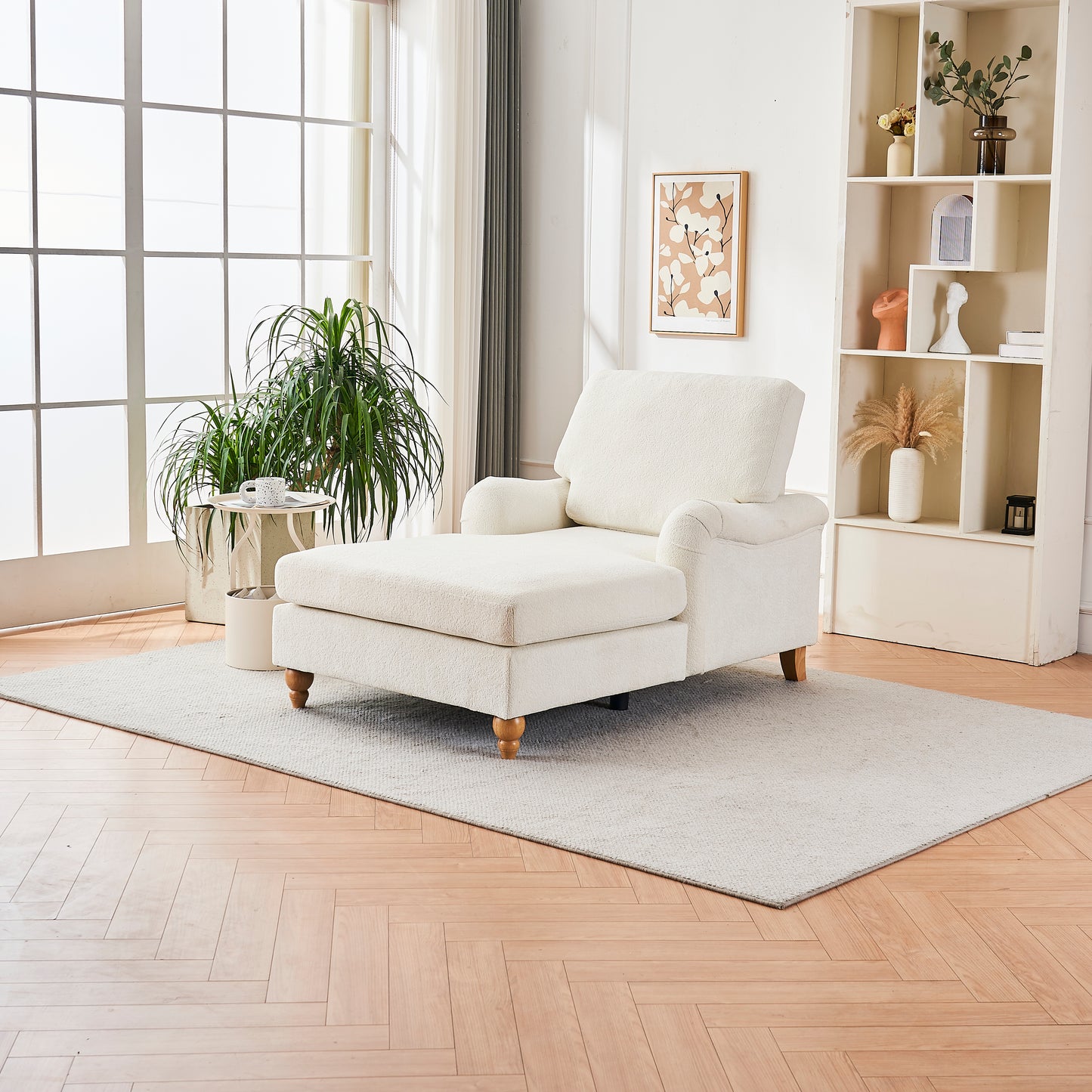 Cream boucle chaise lounge chair with wooden legs