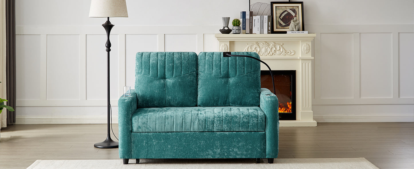 Teal velvet loveseat with tufted cushions and a builtin cup holder