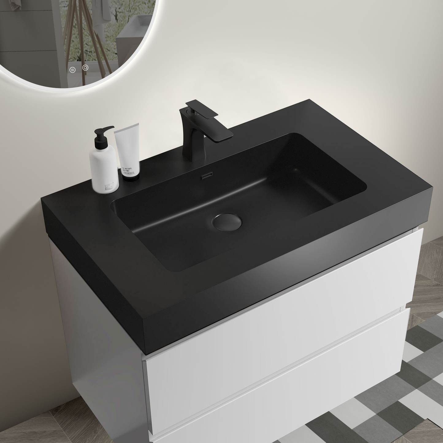 Modern black integrated bathroom vanity sink with matte black faucet and white cabinet