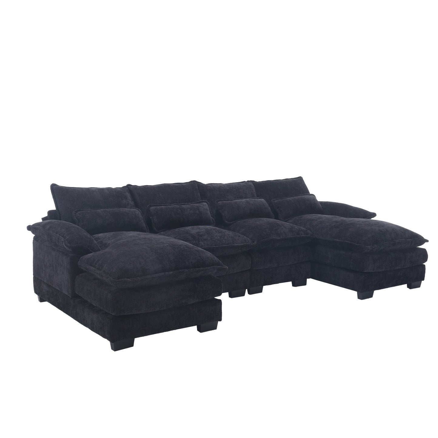 Plush dark gray sectional sofa with deep cushions and multiple throw pillows