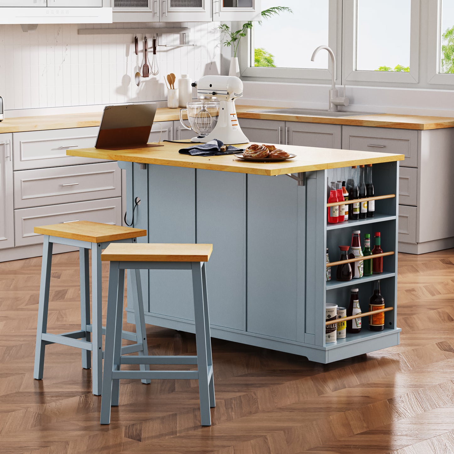Light blue kitchen island with butcher block top bar stools and condiment shelving