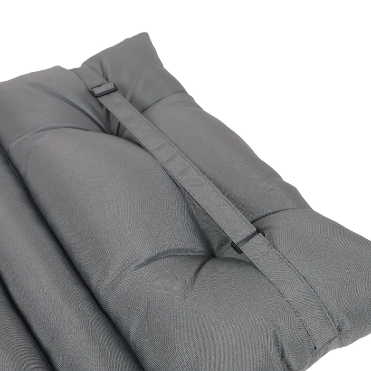 Close up of a tufted gray outdoor seat cushion with adjustable straps