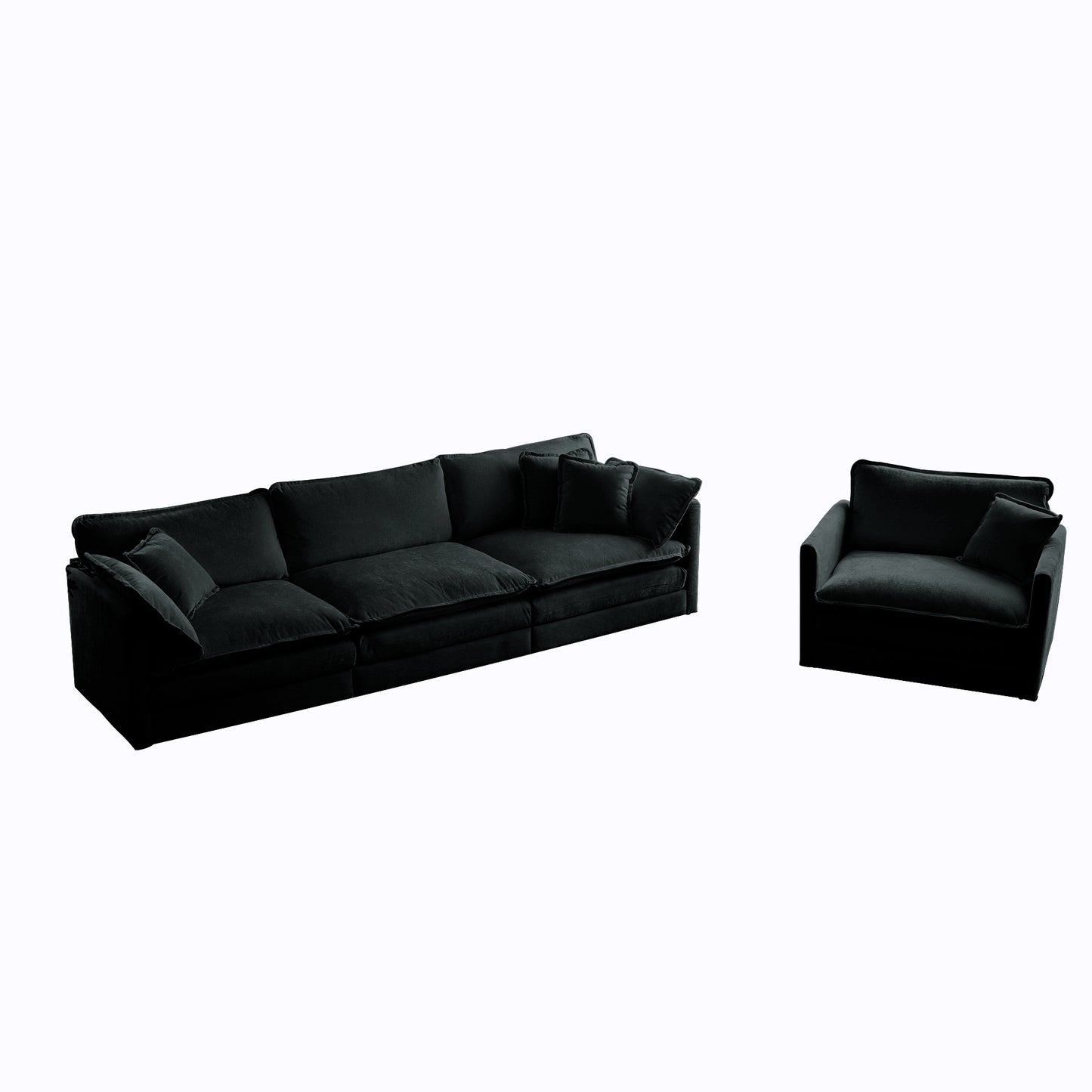 Plush black velvet sectional sofa with three seat cushions and accent pillows