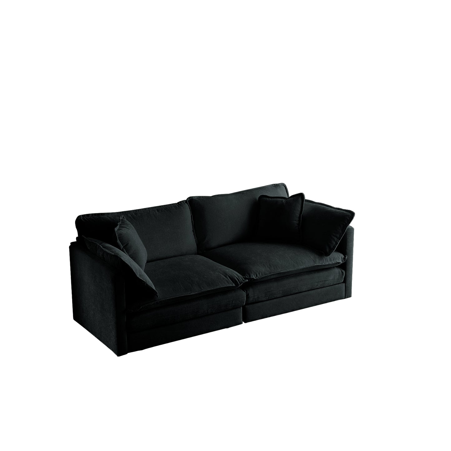Plush black velvet sectional sofa with deep seating and scatter cushions