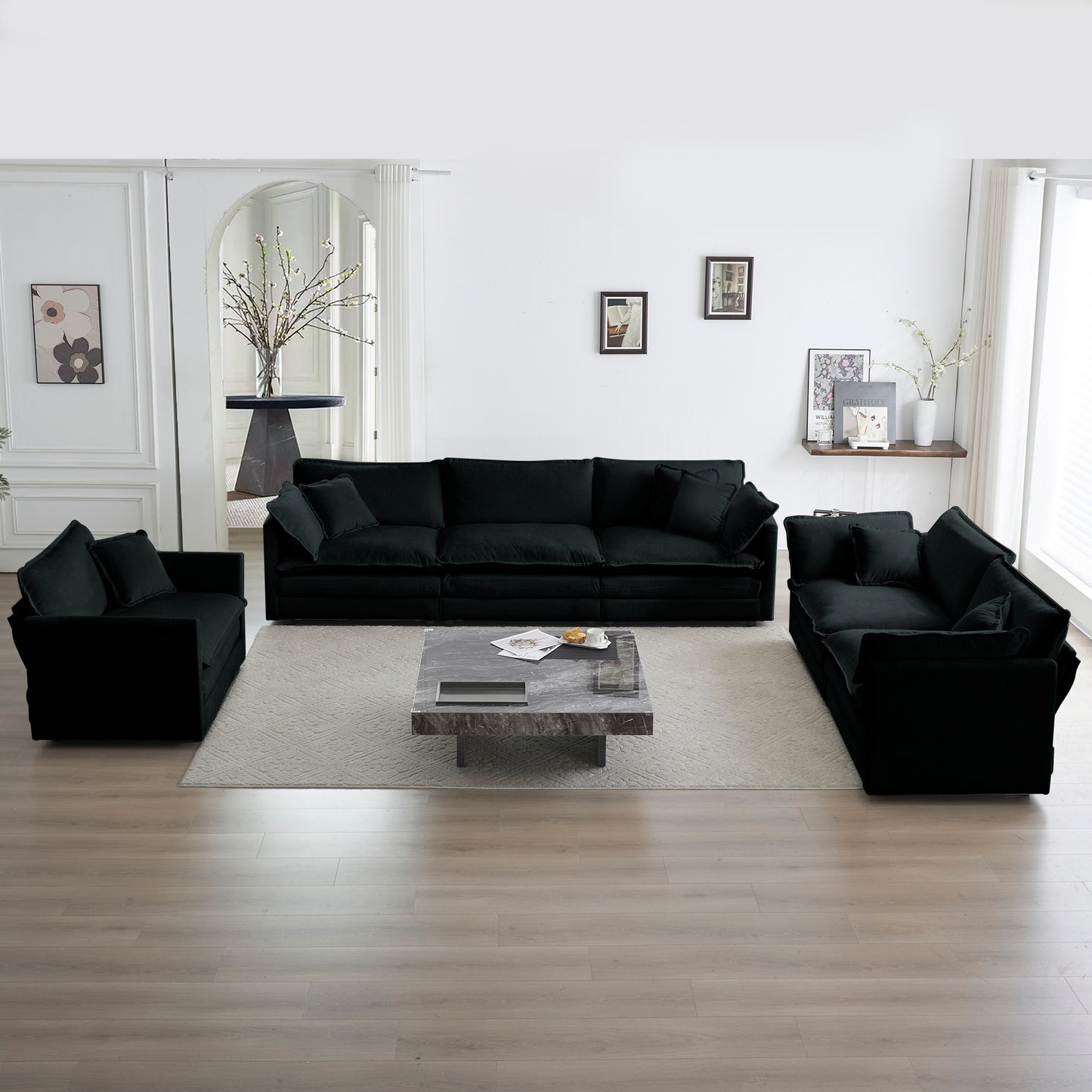 Plush black velvet sectional sofa with deep seats perfect for modern living room comfort