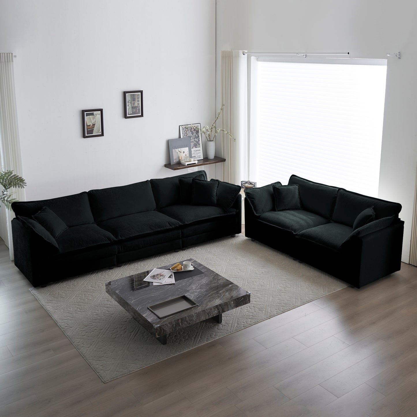 Plush black sectional sofa with deep seats and plush pillows ideal for modern living rooms