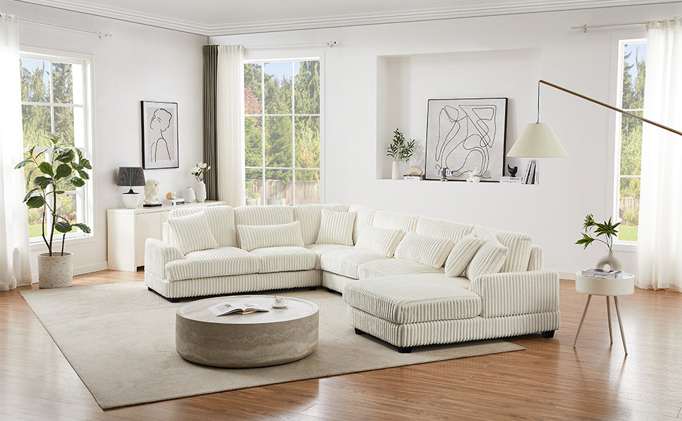 Plush cream corduroy sectional sofa with deep cushions and plush accent pillows