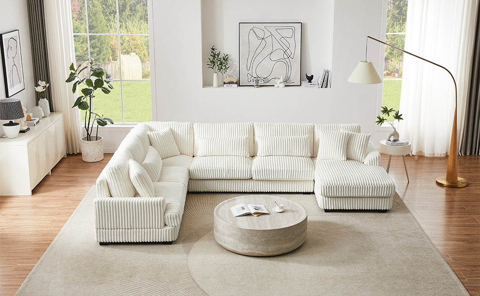 Cream corduroy sectional sofa with plush pillows ideal for spacious living rooms
