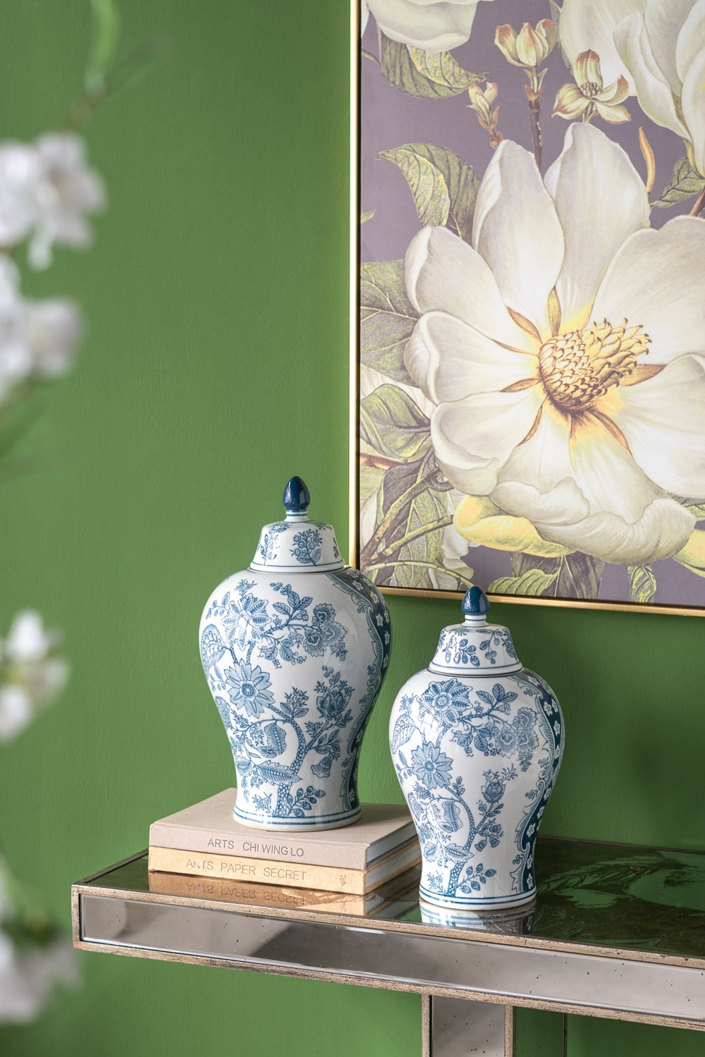 Pair of blue and white ceramic ginger jars with floral patterns