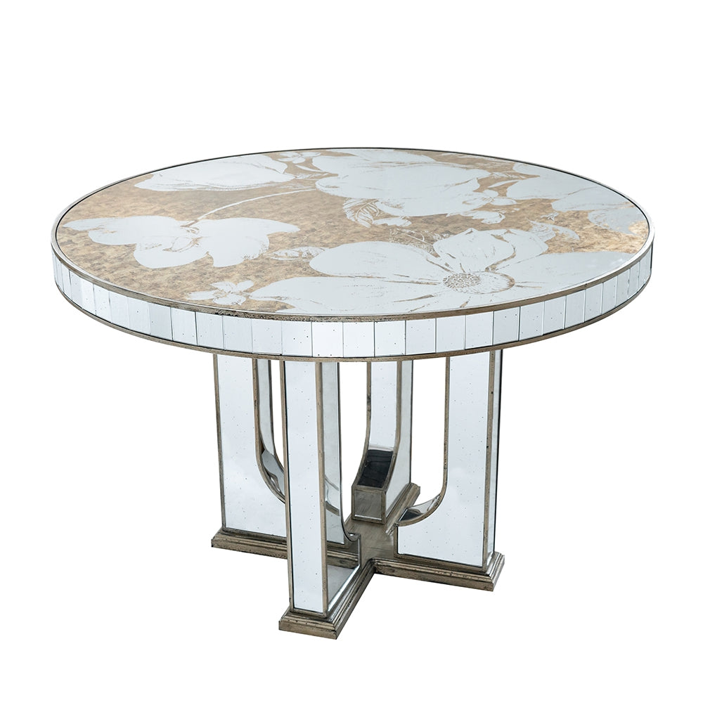 Round mirrored dining table with floral etched glass top and geometric base