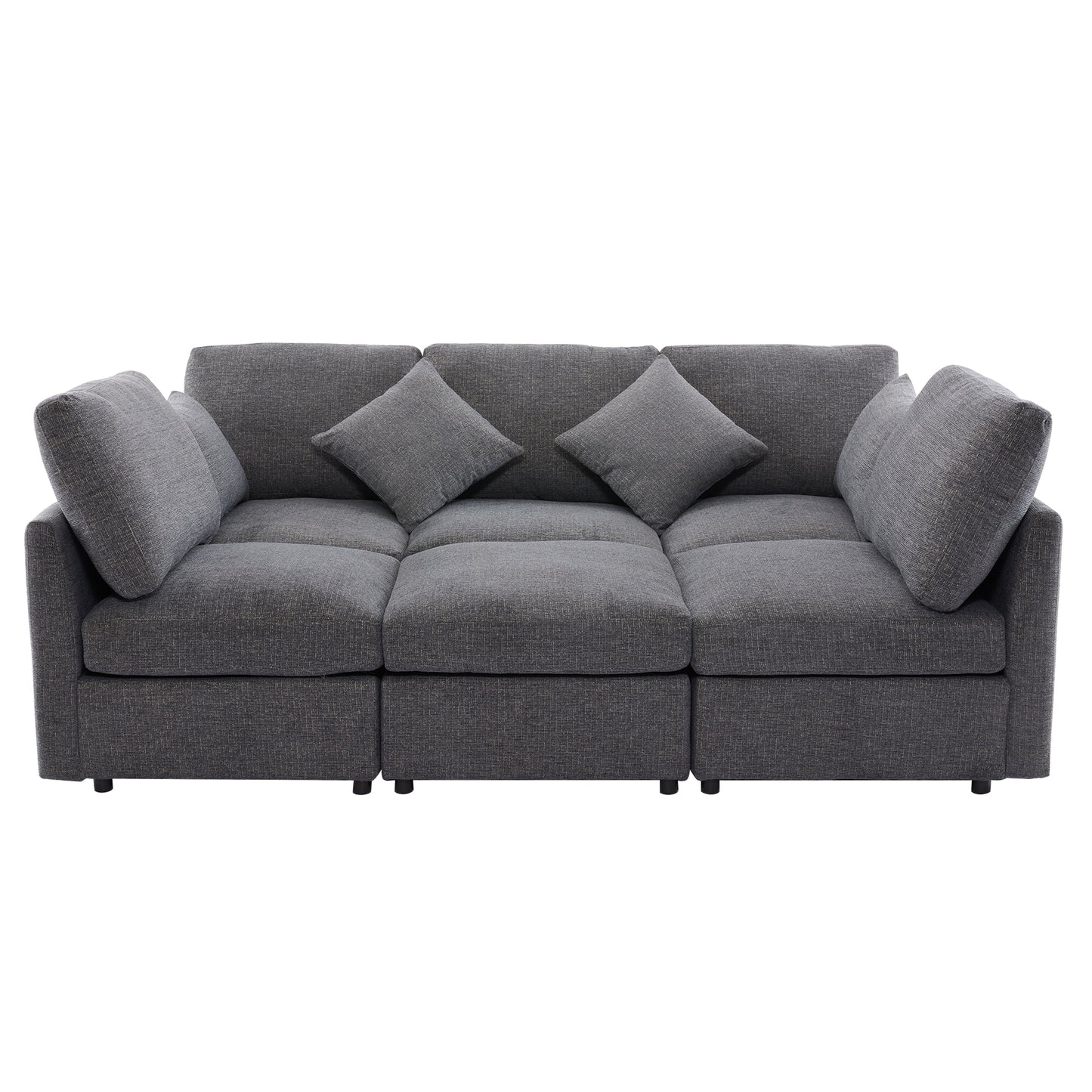 Charcoal gray modular fabric sofa with three seats and accent pillows