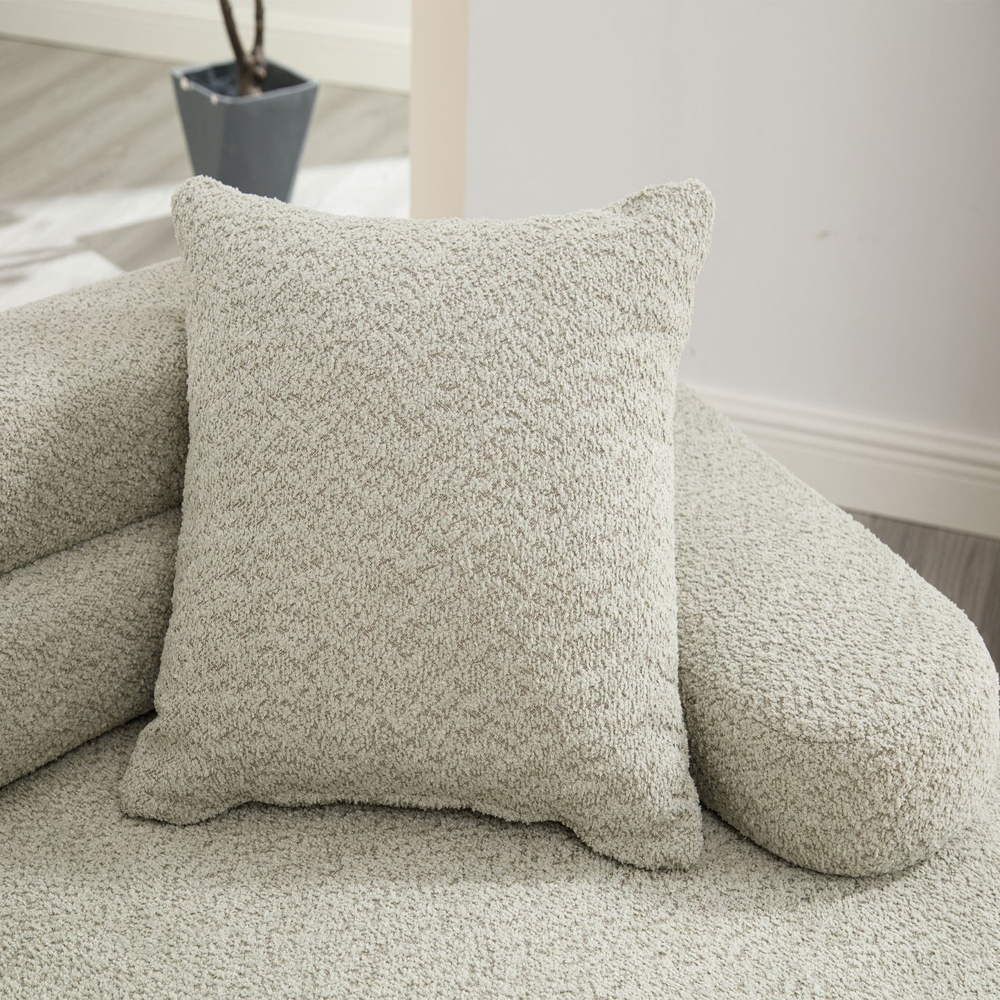Cozy chenille boucle pillow in light beige perfect for sofa comfort