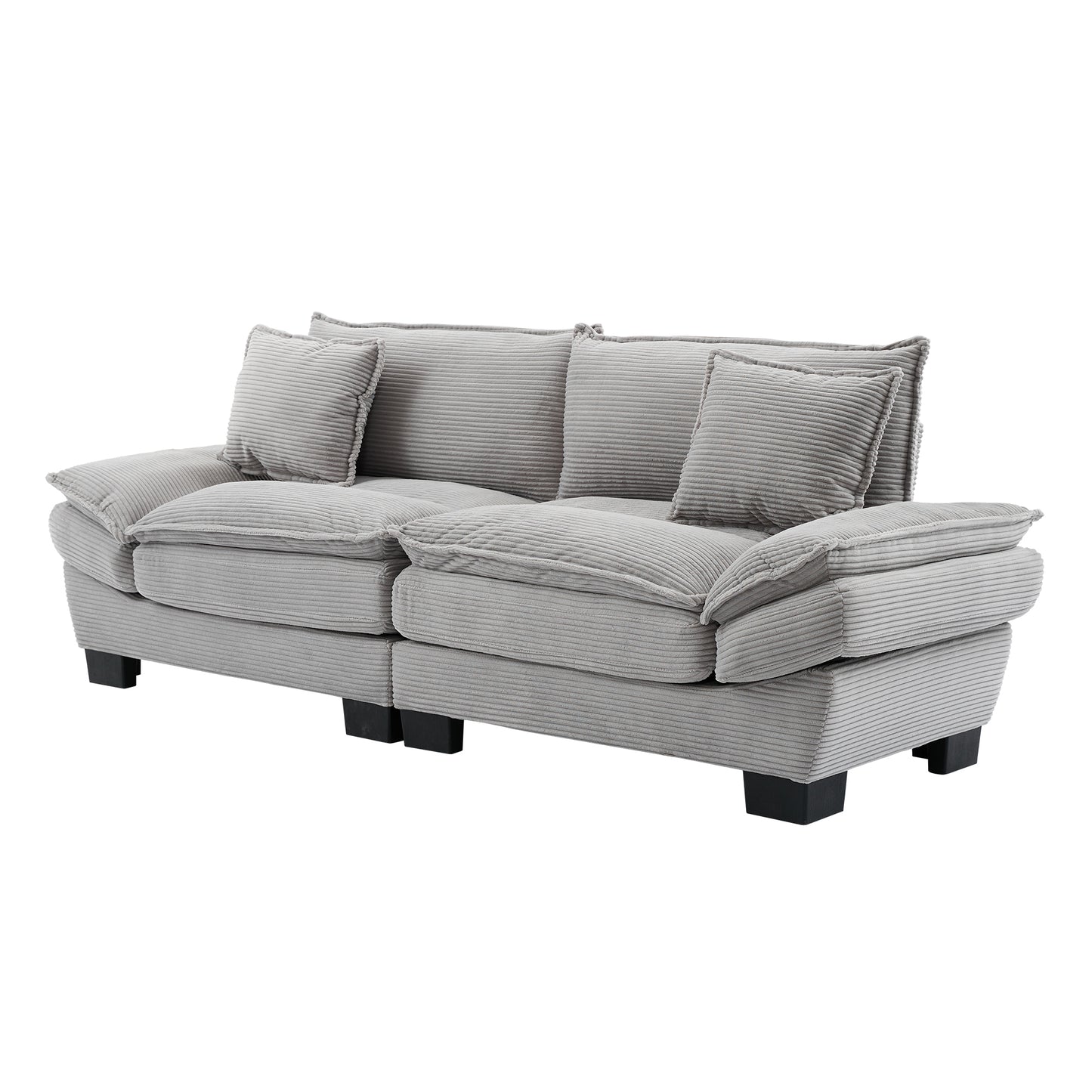 Plush grey corduroy sofa with two seat cushions and four throw pillows