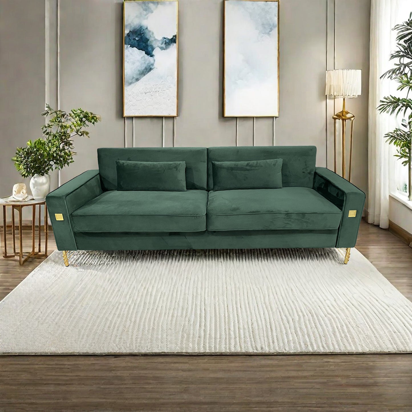 Emerald green velvet sofa with gold legs and decorative accent pillows