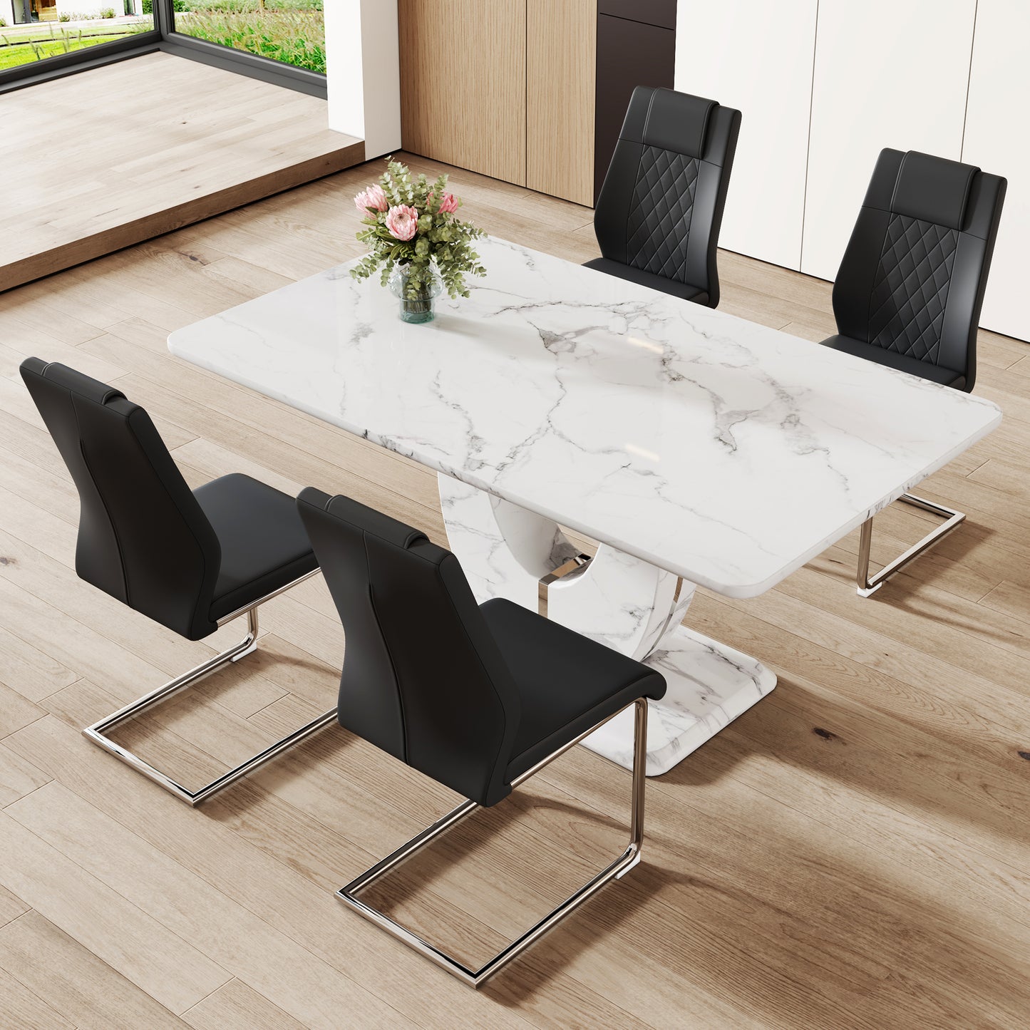White marble dining table with four black leather chairs in modern dining room