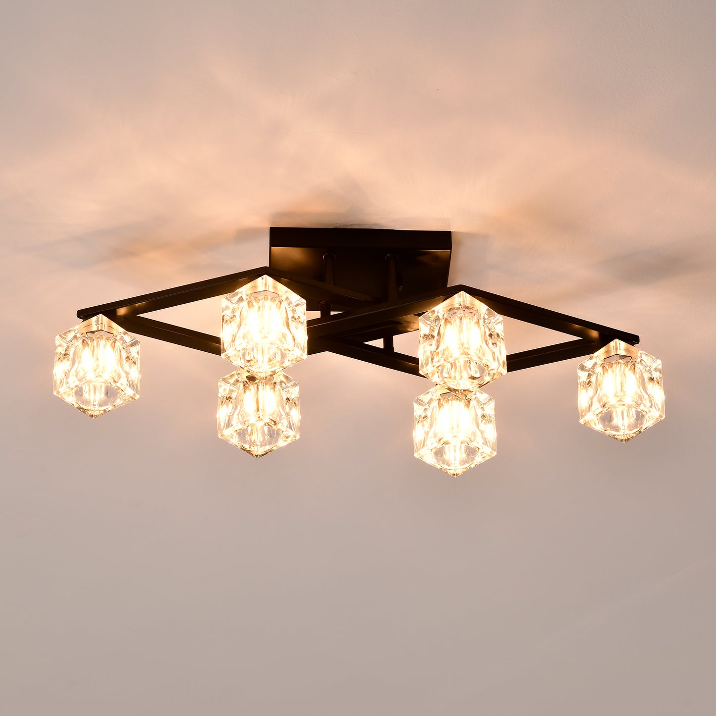 Modern flush mount ceiling light with geometric black frame and crystal cube shades