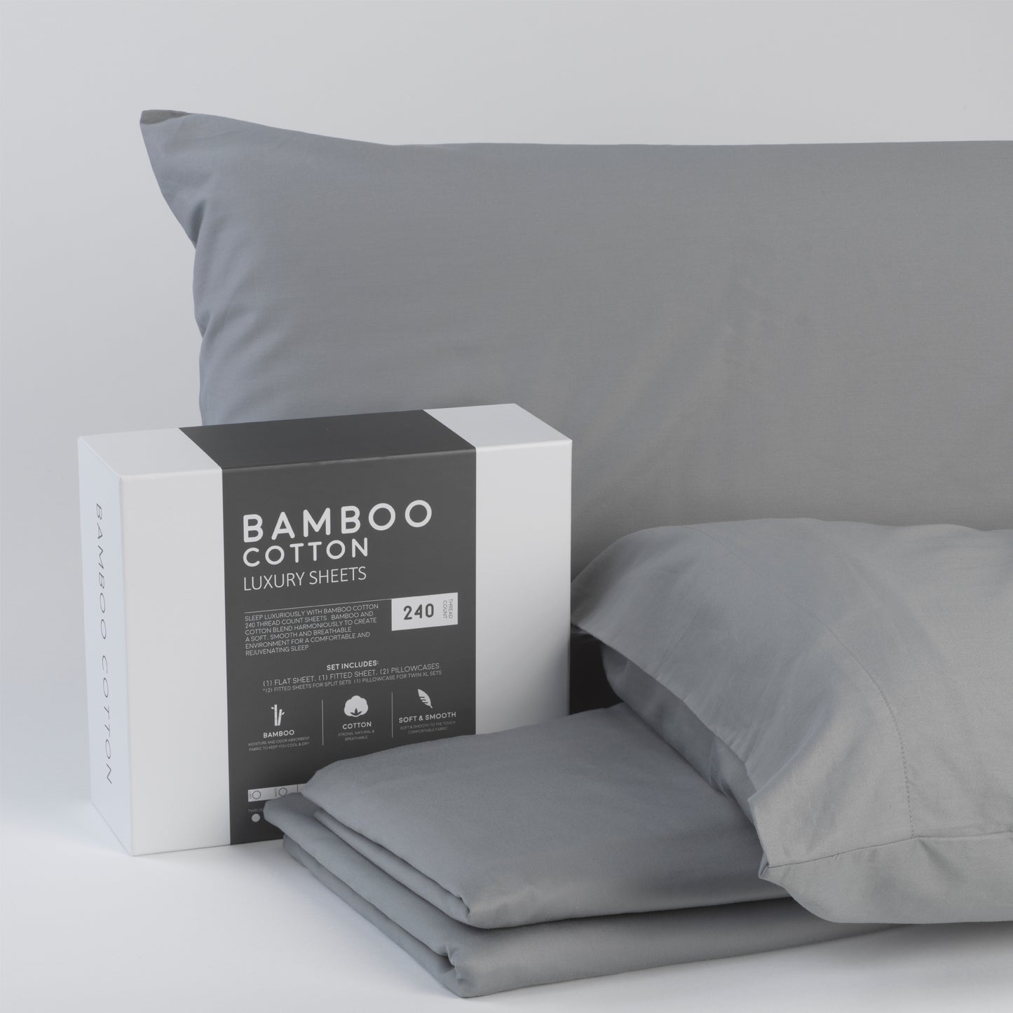 Grey bamboo cotton luxury sheets stacked with a pillowcase