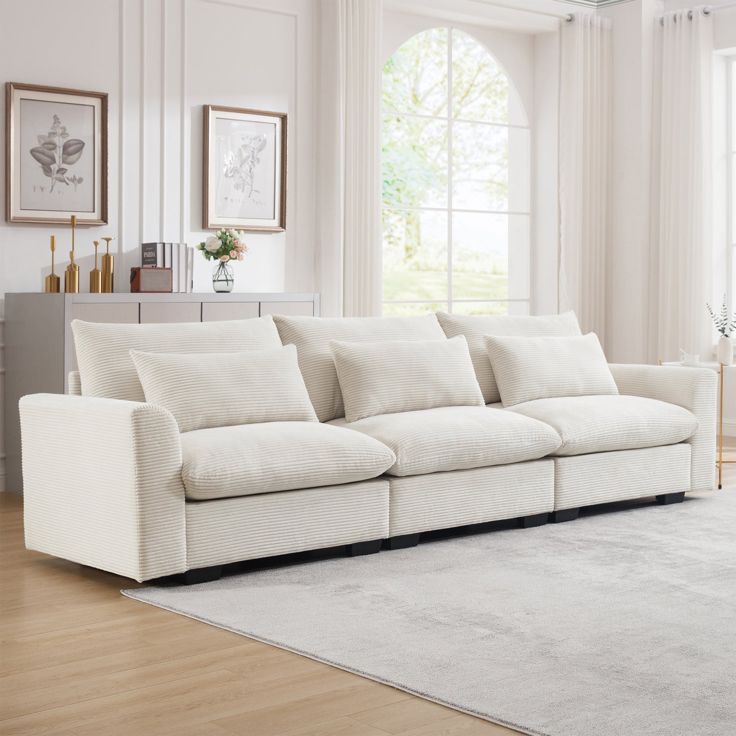 Plush cream corduroy sectional sofa with deep seats and multiple throw pillows perfect for modern living rooms