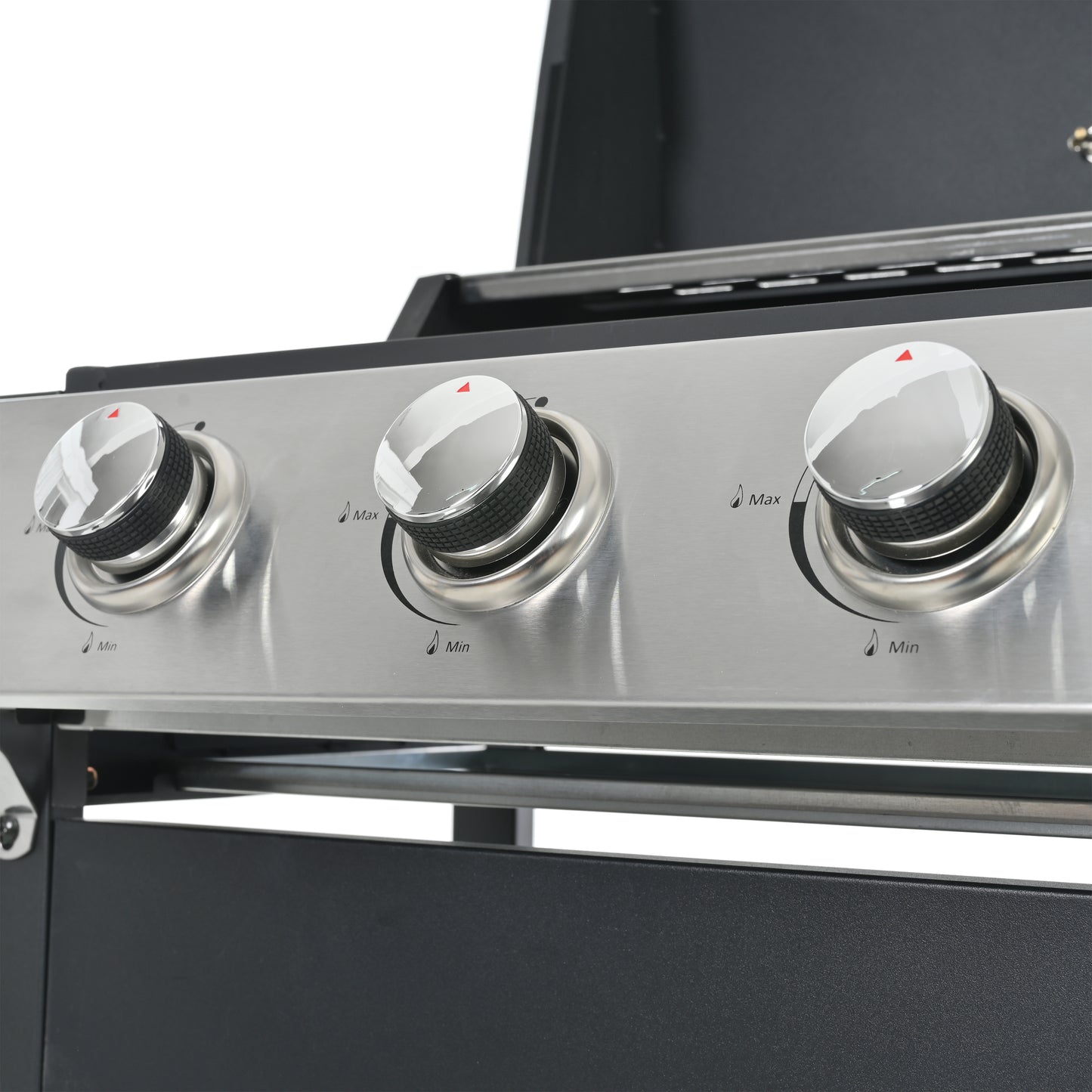 Closeup of three chrome knobs on a stainless steel gas grill control panel showing minmax settings
