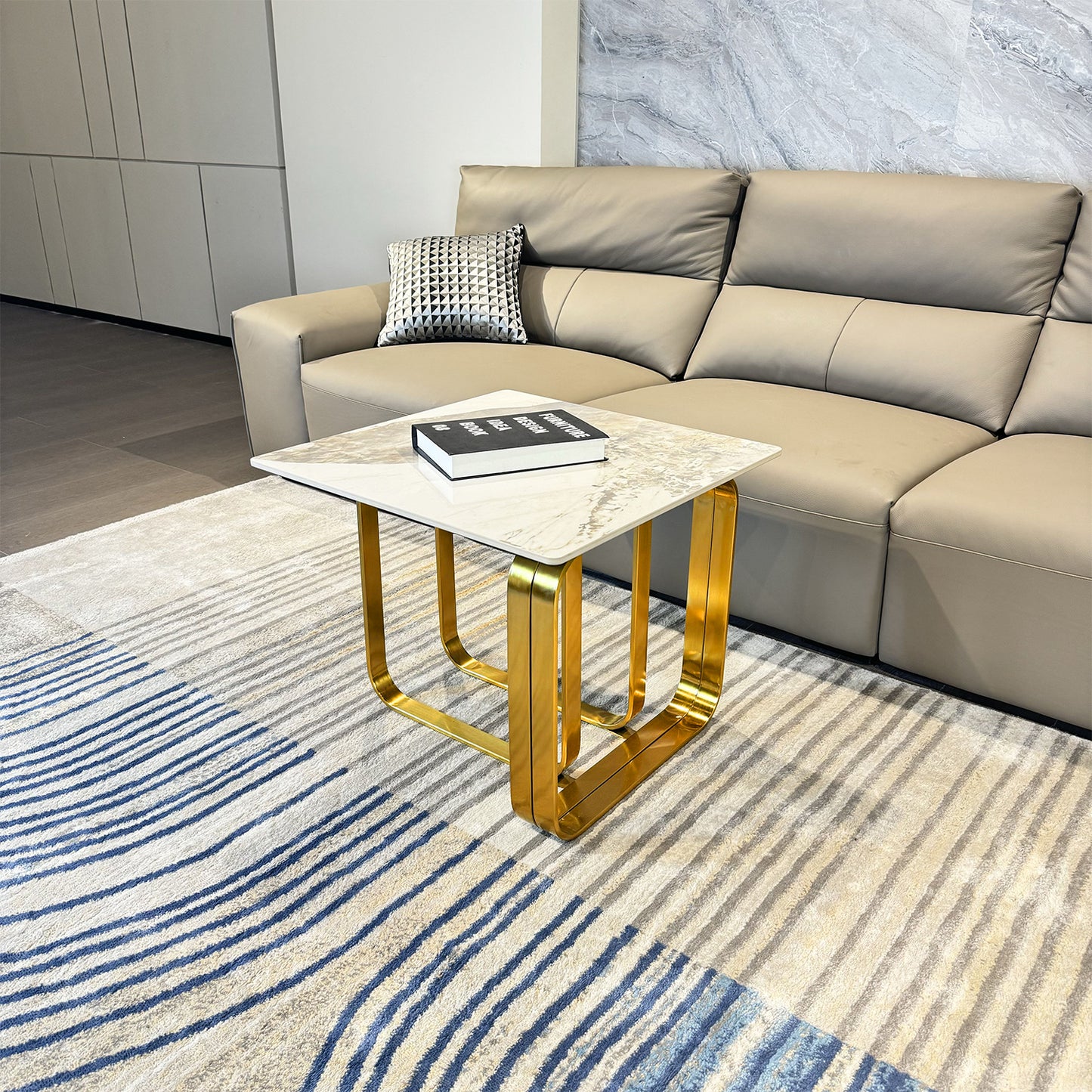 Square marbletop side table with polished gold metal frame