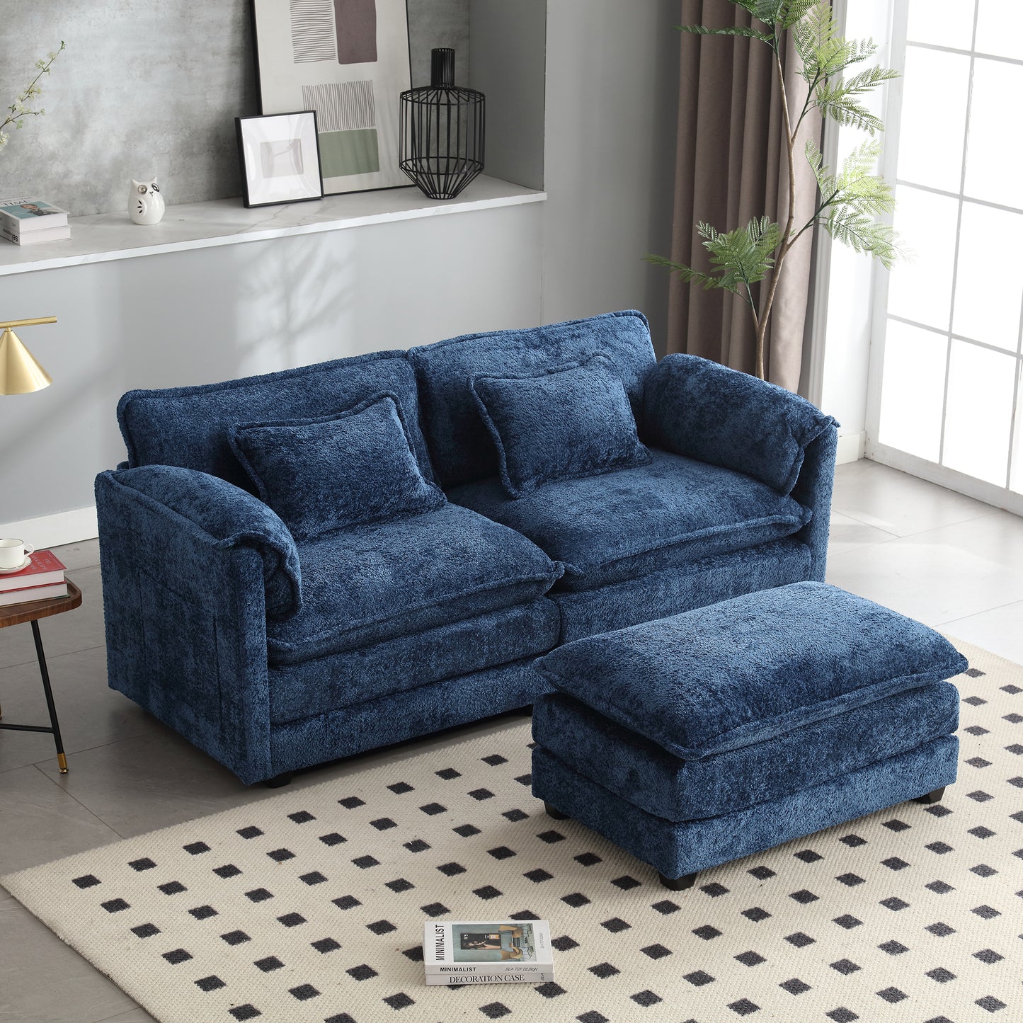 Plush blue velvet sofa with matching ottoman ideal for modern living room decor