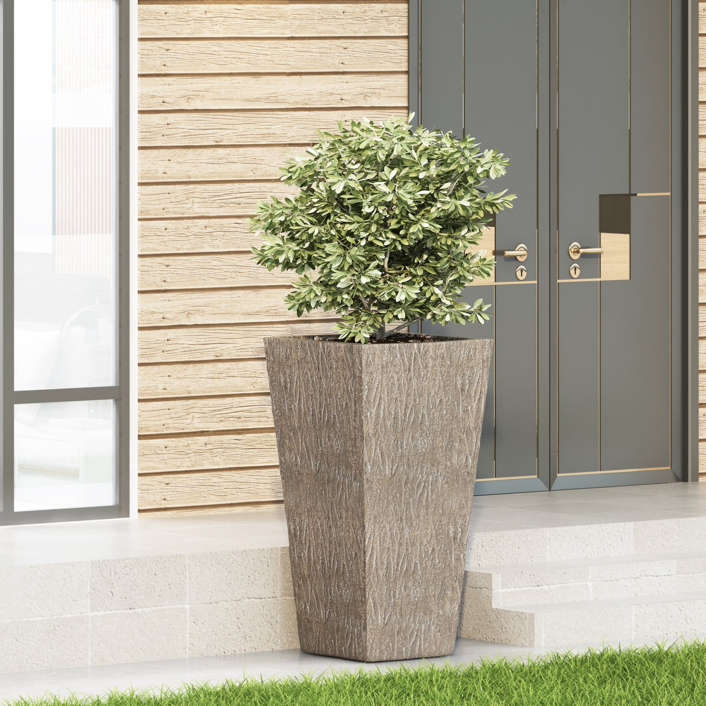 Textured modern planter with lush green foliage on a modern homes porch