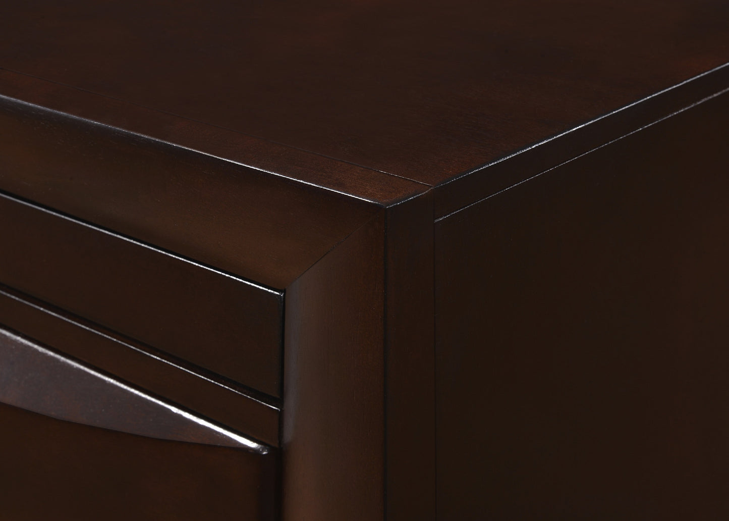 Rich espresso wood finish on a modern dresser drawer front showcasing sleek lines