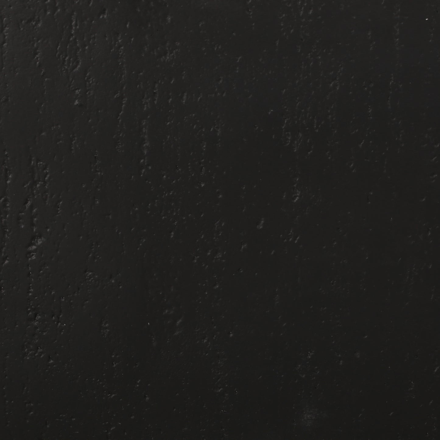 Textured black wall paint with a matte finish ideal for modern interiors