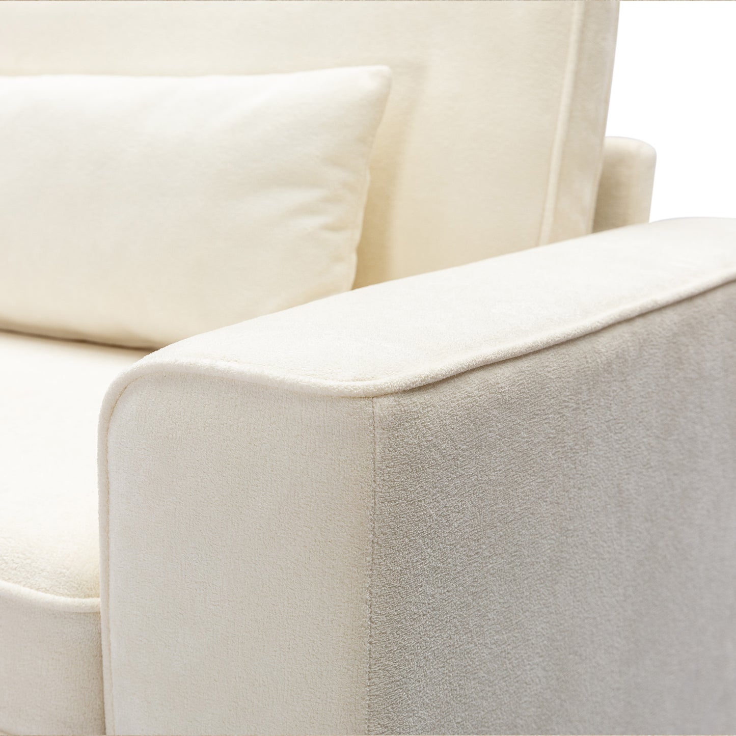Close up of cream velvet sofa armrest with piped edge detail
