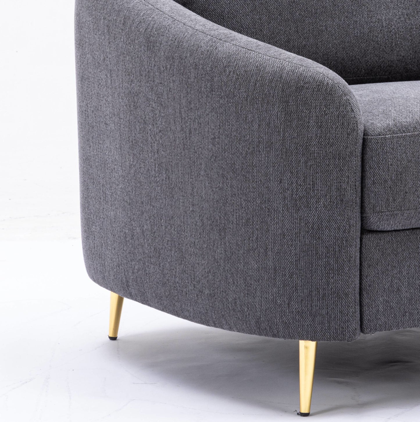 Modern charcoal grey fabric armchair with tapered gold legs