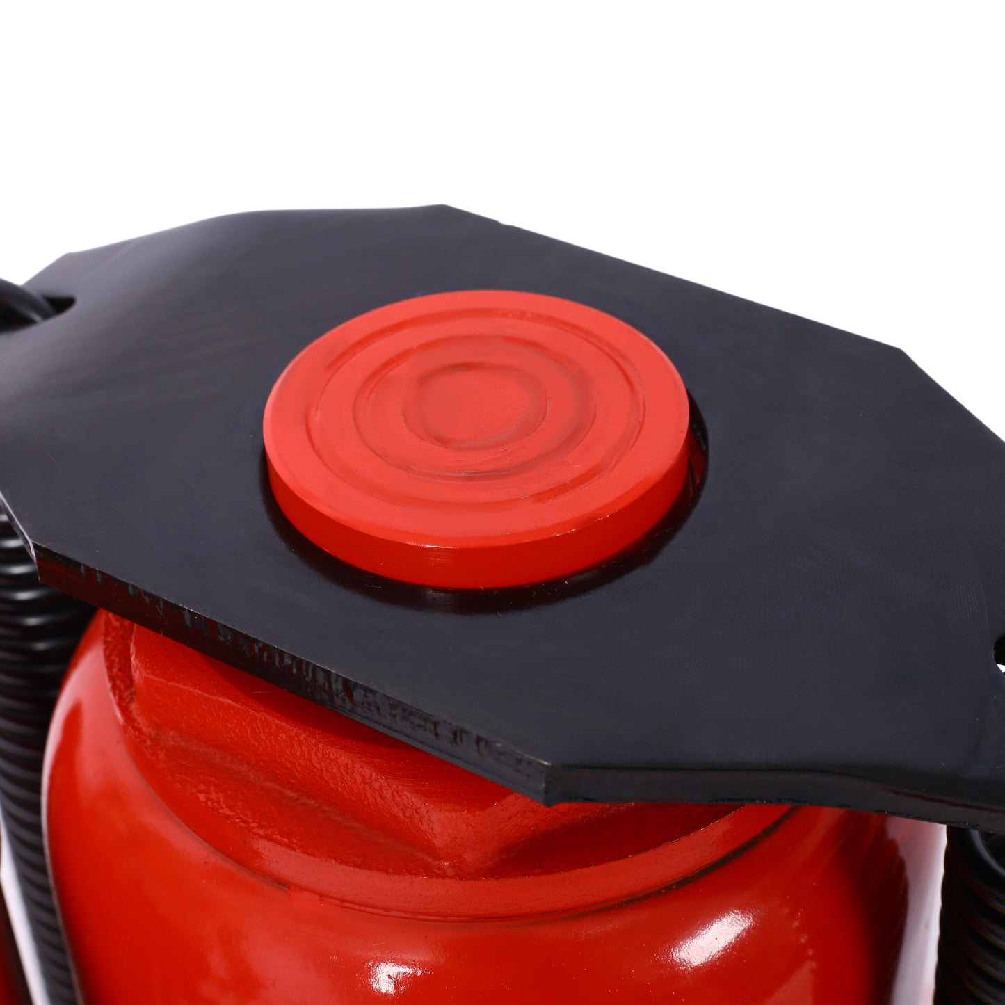 Red hydraulic jack with black steel saddle and red rubber grip for lifting heavy loads